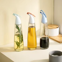 the new glass oil can automatically open and close the kitchen oil spray bottle creative soy sauce vinegar push type oil can