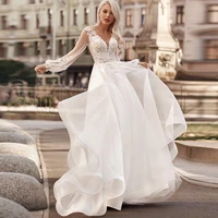 new arrival long sleeves wedding gown tulle v neck appliqued a line plus size bridal dress vestido de novia