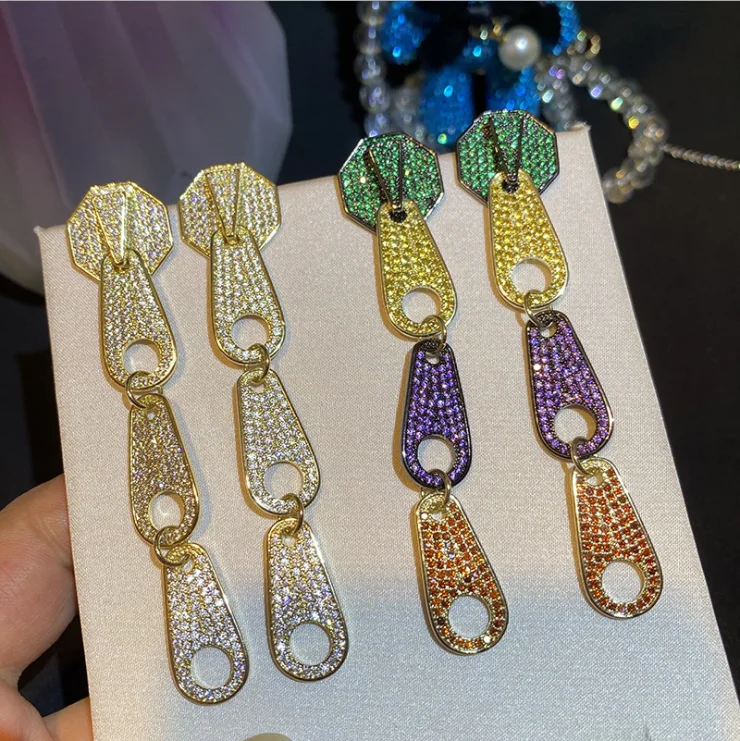 

Women Zipper earrings inlaid zircon zipper metal wind ins jump earrings