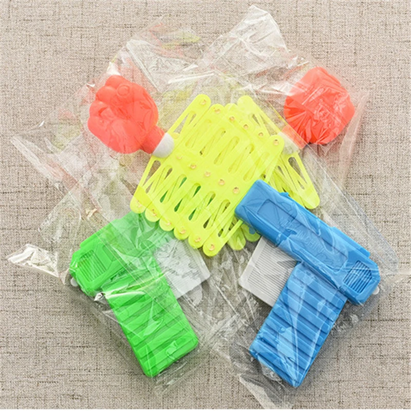 

Retractable Fist Shooter Trick Toy Gun Funny Child Kids plastic Party Festival Gift For fun Classic Elastic Telescopic Fist Toy