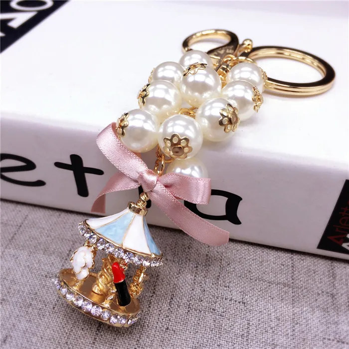 New Creative Fashion Carousel Key Chain Personality Trend Pearl Charm Key Chain Lady Cute Bag Mobile Phone Pendant Key Chain