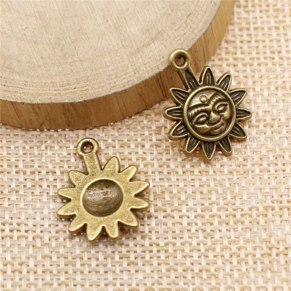 

Бесплатная доставка, 50 шт., 19x15 мм, античные бронзовые подвески в виде солнца, «сделай сам», Ретро ювелирные изделия, подходят для сережек, брелоков, карт для волос, подвесок, аксессуары