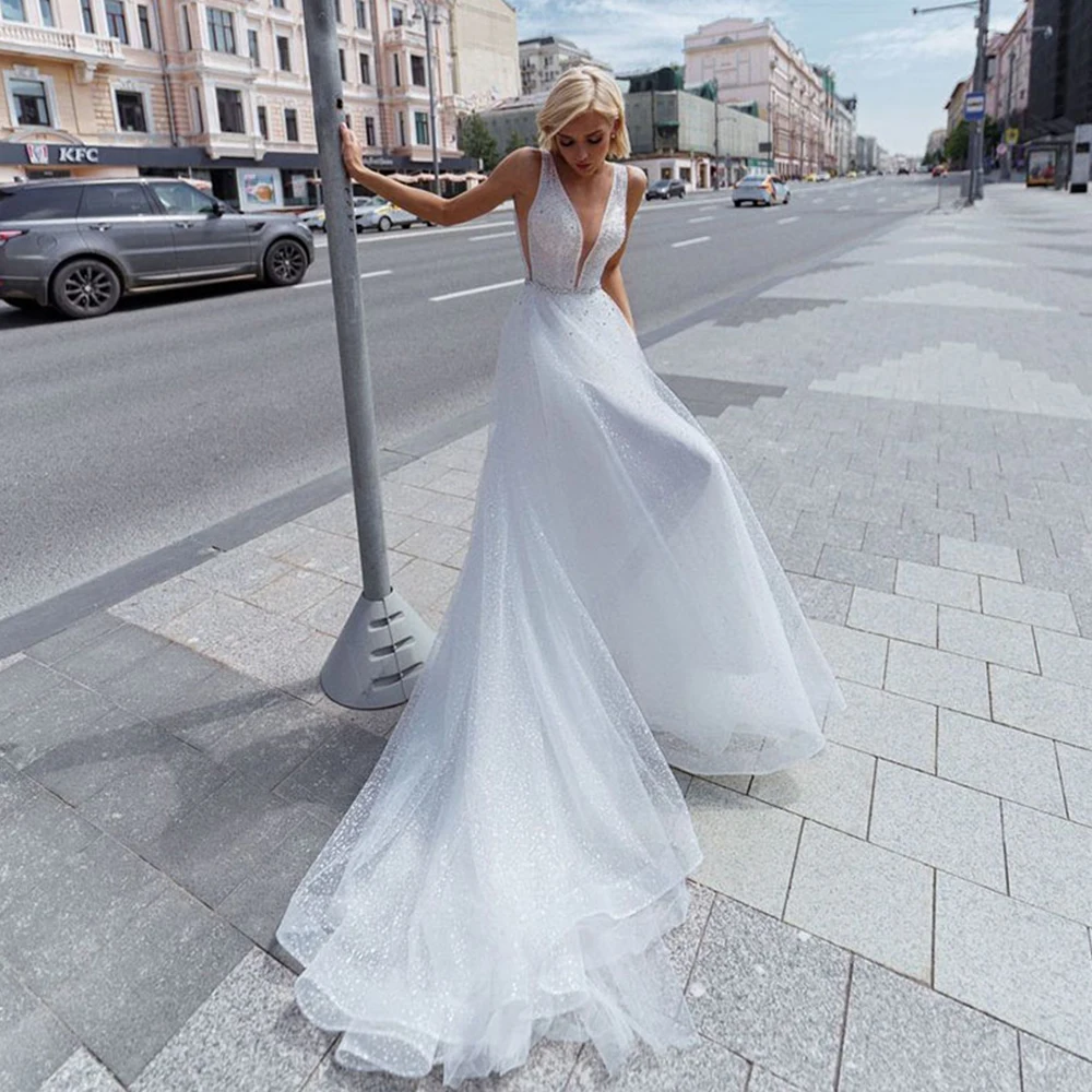 

Элегантные свадебные платья принцессы, а-силуэт, индивидуальный пошив, сексуальное длинное блестящее платье без рукавов с V-образным вырезо...