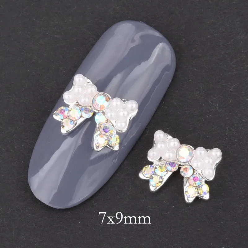 10pcs Strass 3d Nail Bow Tie AB White Rhinestone Pearl Design Nail Art Decoration Glamour Silver Alloy Jewelry Nail QB028-029 - Цвет: QB028