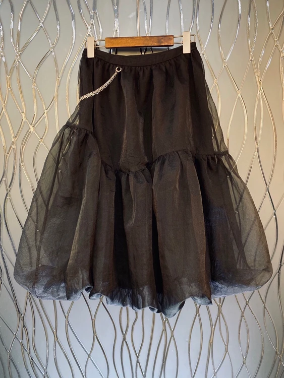 

2021 spring and summer new women's elastic waist side drill chain stitching micro Peng versatile medium length skirt 318