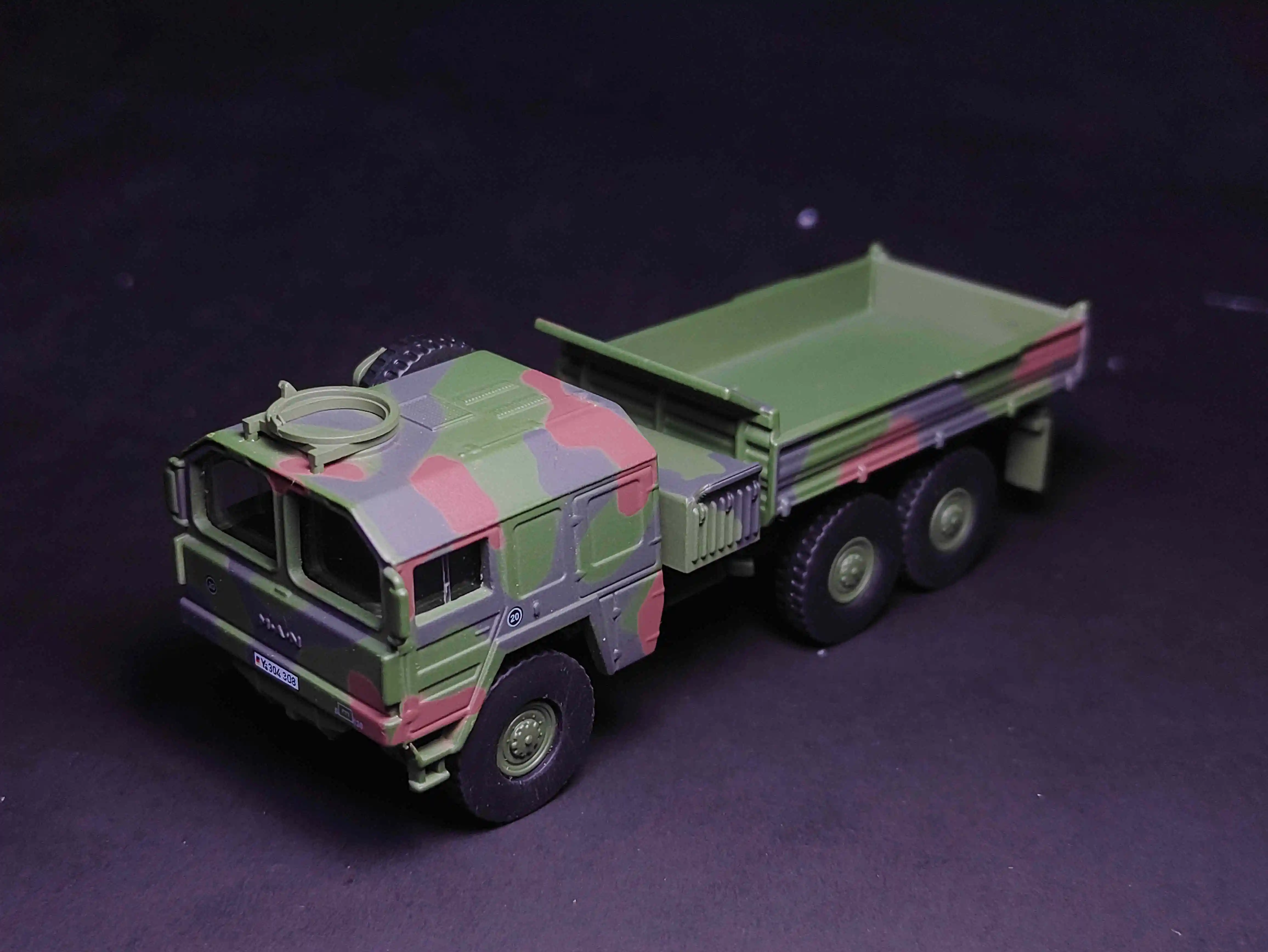 

Schuco 1/87 MAN 7to KAT Dumper camouflage Die Cast Model Car Collection Limited