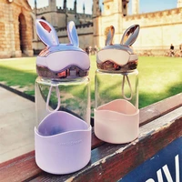 creative cartoon rabbit water bottle cute rabbit ear glass bottle with silicone sleeve portable drinking bottles for women gifts