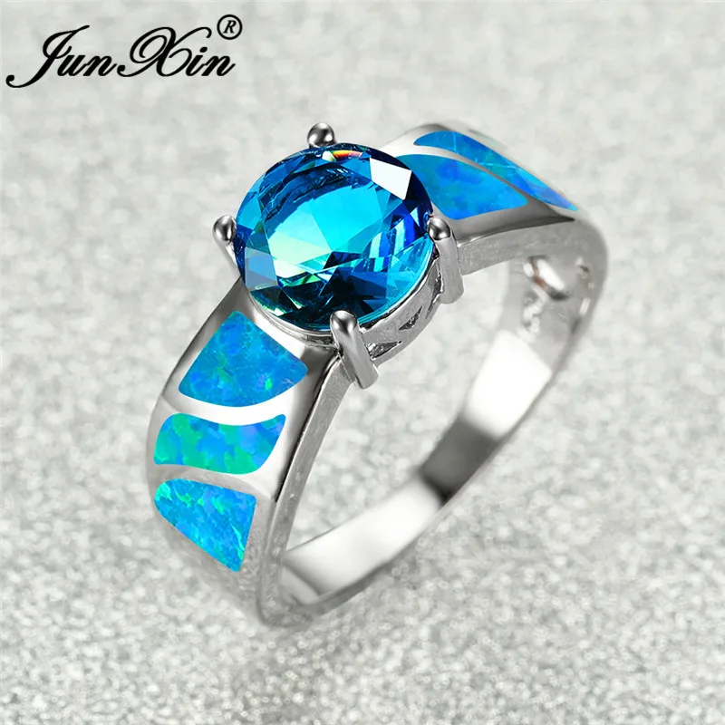 Женское кольцо с голубым огненным опалом обручальное градиентом радуги