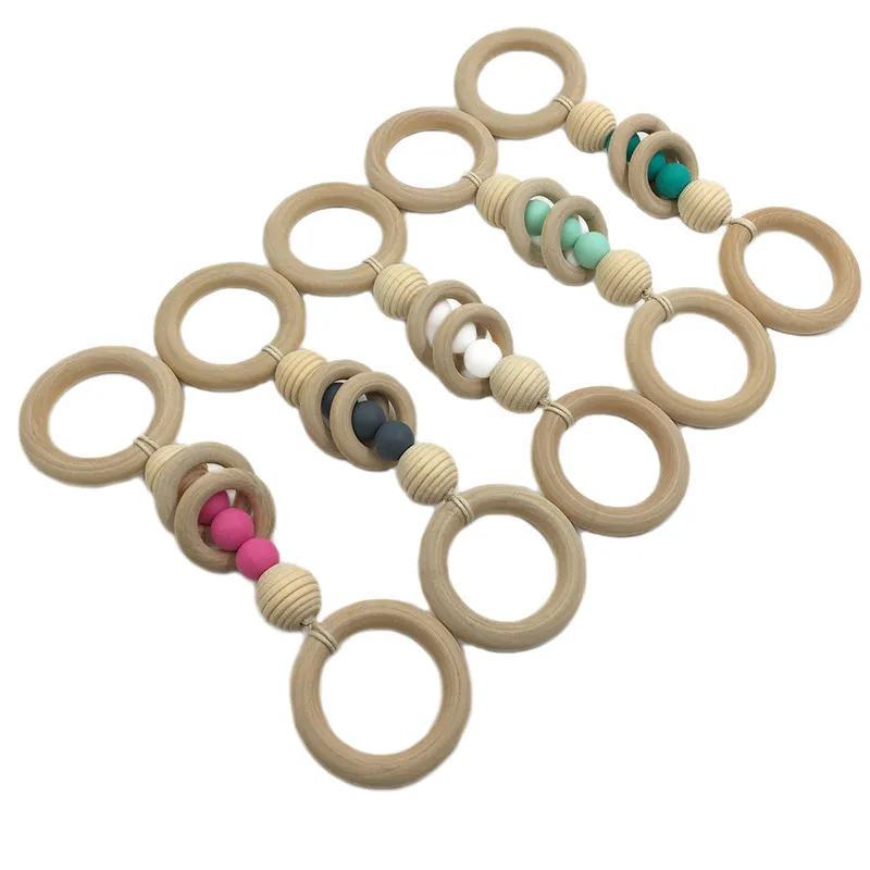 

Baby Teether Fashion Baby Wood Rattles Toys Teether Play Gym Nursing Cartoon Animal Wooden Teether Chew Beads Teething Gifts