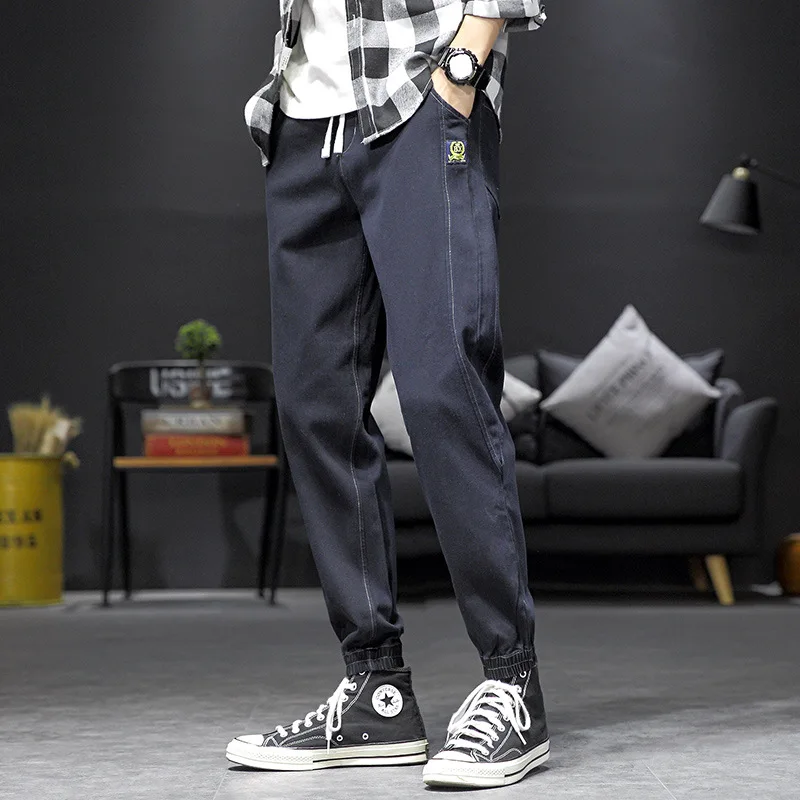 

Jeans men's loose fitting autumn new trend students' sports and leisure closed leg Harlan thin solid nine point Leggings