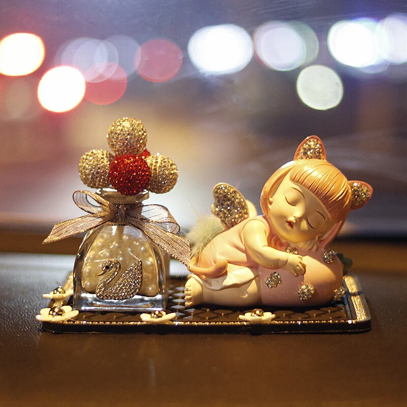 

Car interior creative personality goddess style diamond Aisha ornaments + small wrinkle chrysanthemum cushion