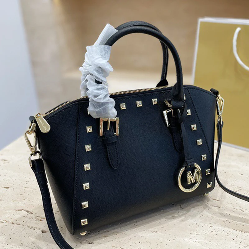 

Retro solid color contrast color rivets high-capacity leather handbags ladies new dumpling bags fashion diagonal shoulder bags