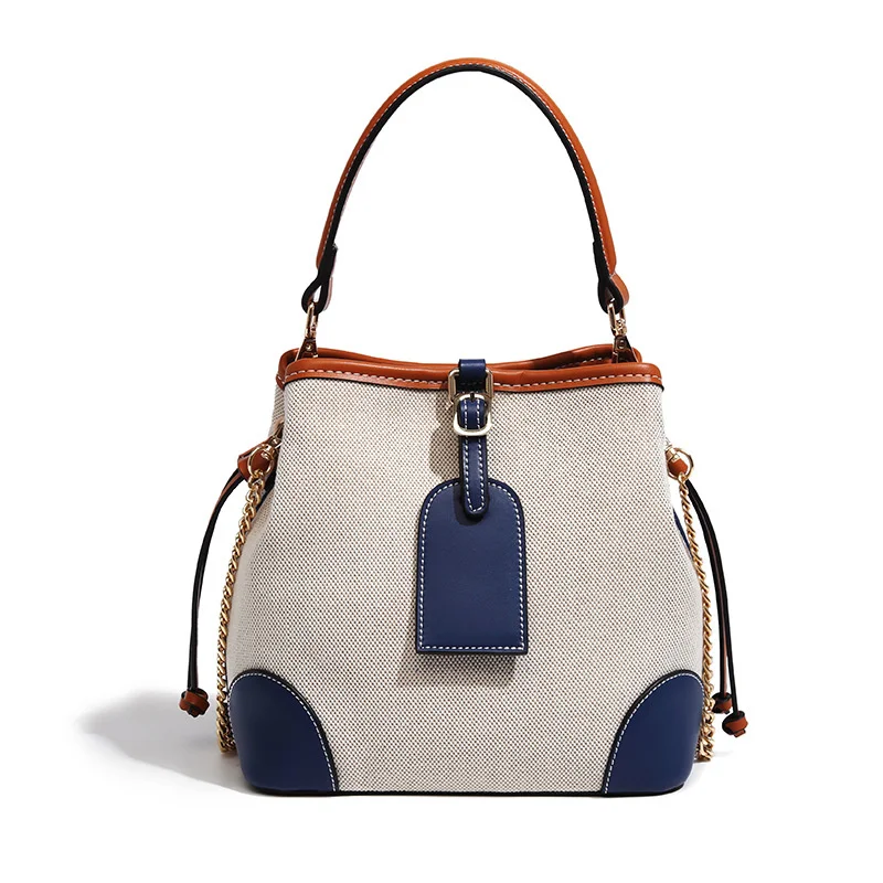 

Women's bag versatile ins fashion commuter canvas bag 2021 new fashion portable drawstring bucket women's Single Shoulder