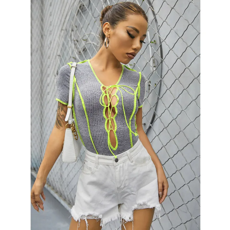 

Europe and the United States foreign trade wish the new trend of the chest bump color line bind hollow-out rib jumpsuits women j