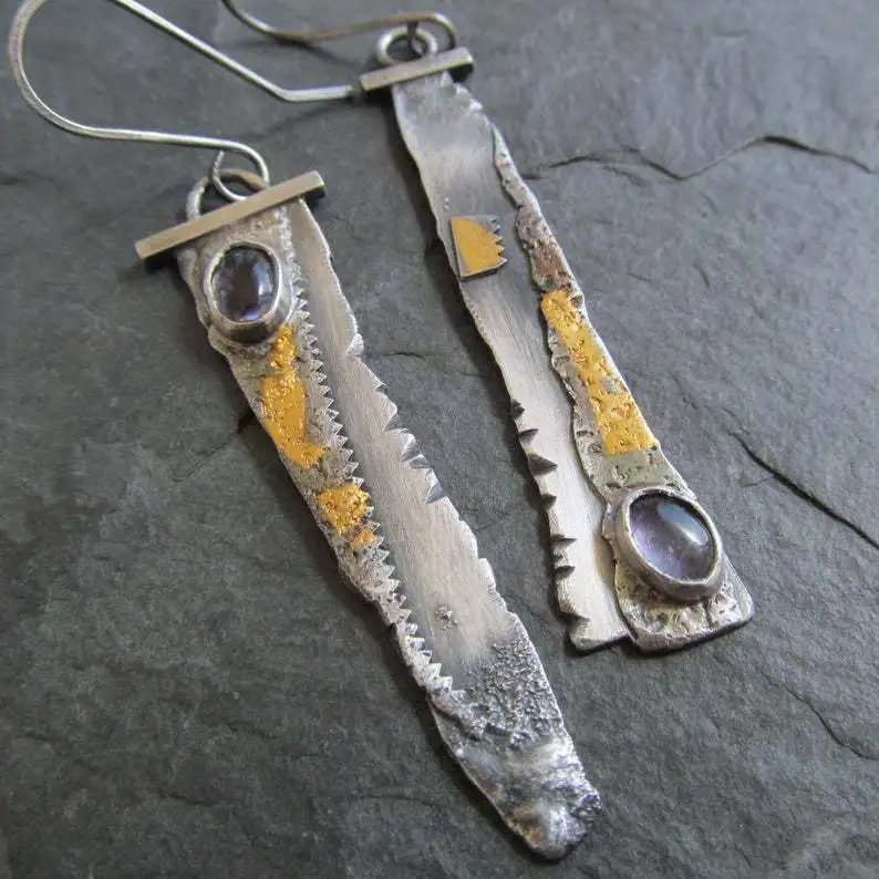 

Серьги-серпы из тайского серебра пробы, с аметистом
