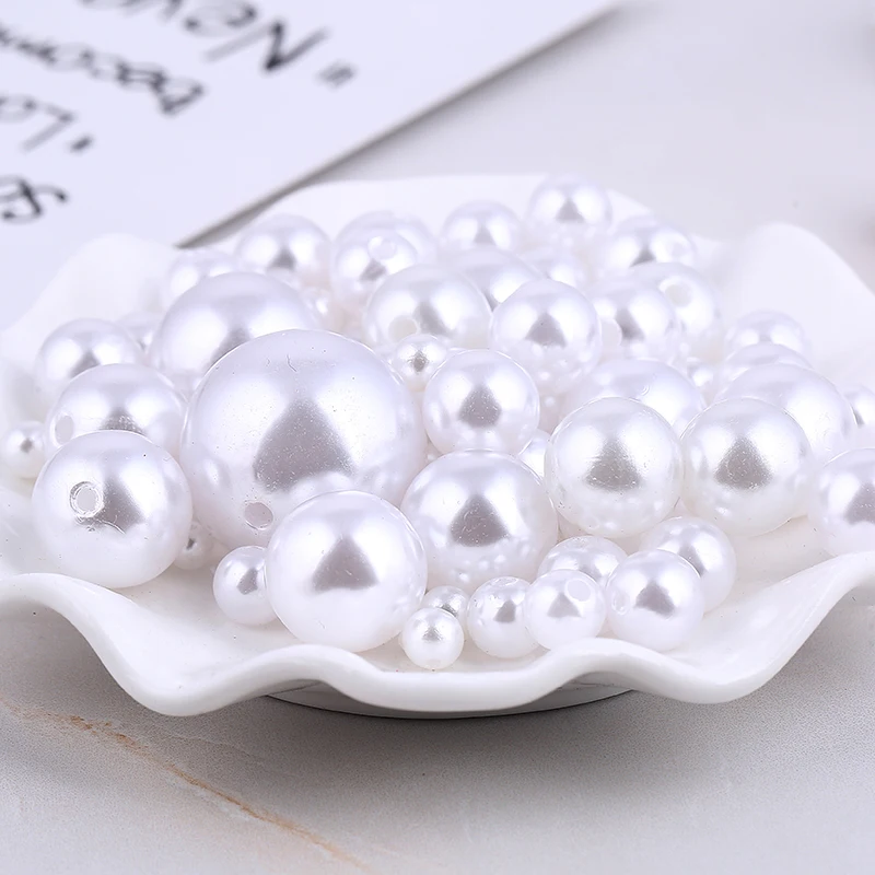 Искусственный жемчуг из АБС пластика белый круглый с отверстиями для творчества