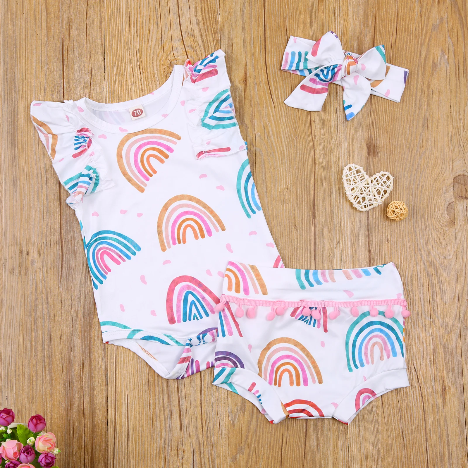 

OPPERIAYA Infant Three Piece Set Baby Rainbow Print Flying Sleeve Bodysuit Crotch Button Top Tassels Shorts Hairband for Newborn