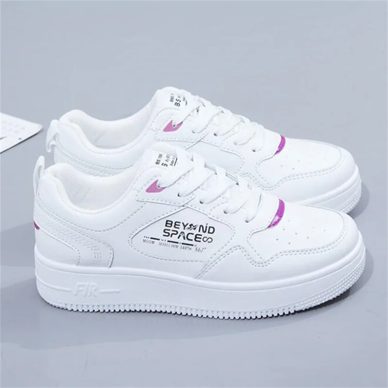 Женские кроссовки из ПУ кожи розовые на плоской вулканизированной подошве