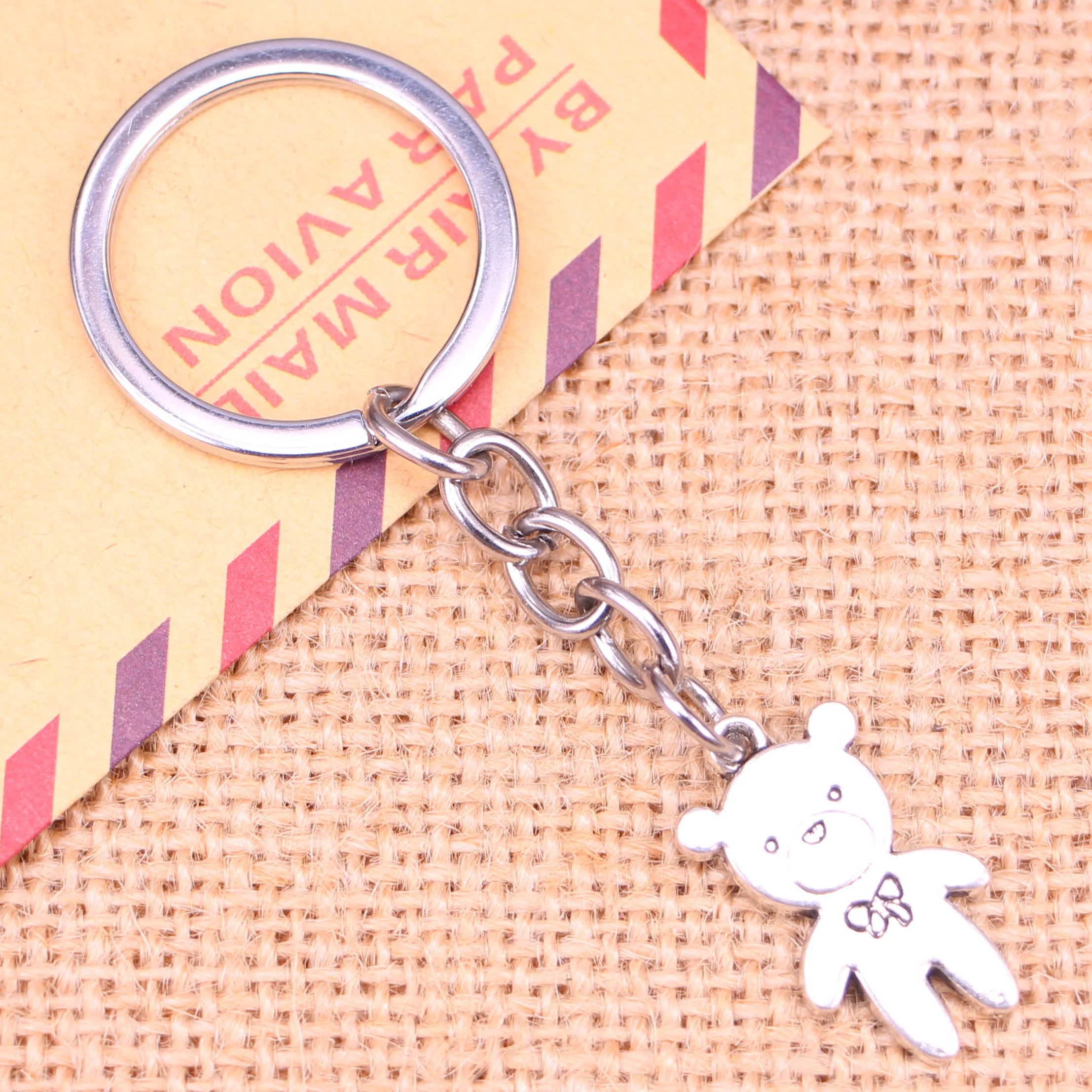 

20pcs New Fashion Keychain 24x14mm bear bow Pendants DIY Men Jewelry Car Key Chain Ring Holder Souvenir For Gift