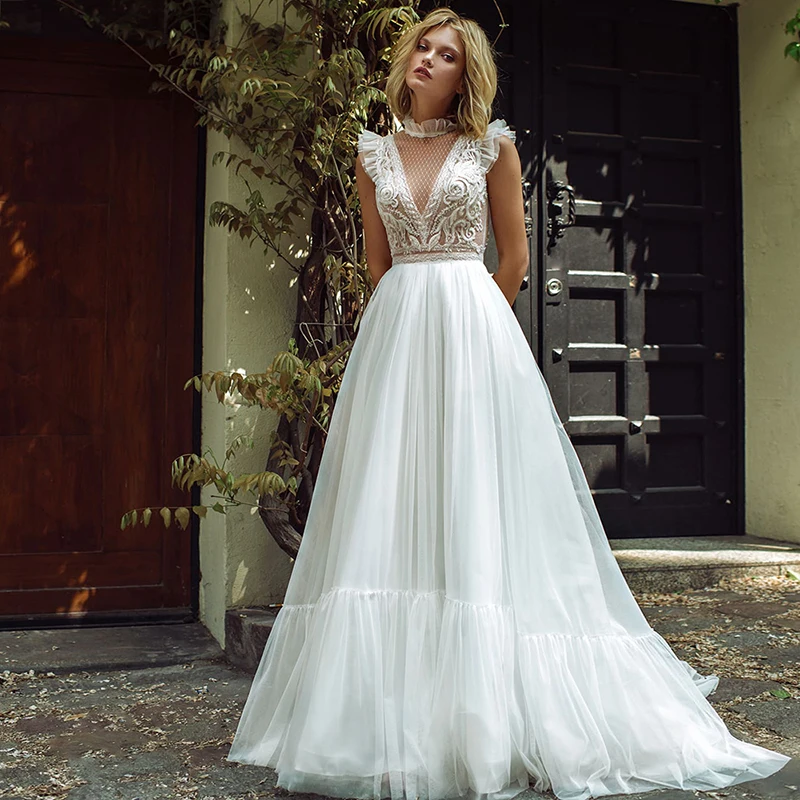 

New Vintage Boho Lace High Neck Bridal Wedding Dresses Cap Sleeves Illusion Buttons Back Wedding Gowns for Bride Sweep Train