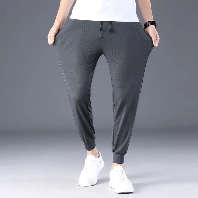 

2021 Oversized Casual Pants Men's Summer Ultra Thin Breathable Quick Drying Sports Pants Loose Legged Men's Pants 10429
