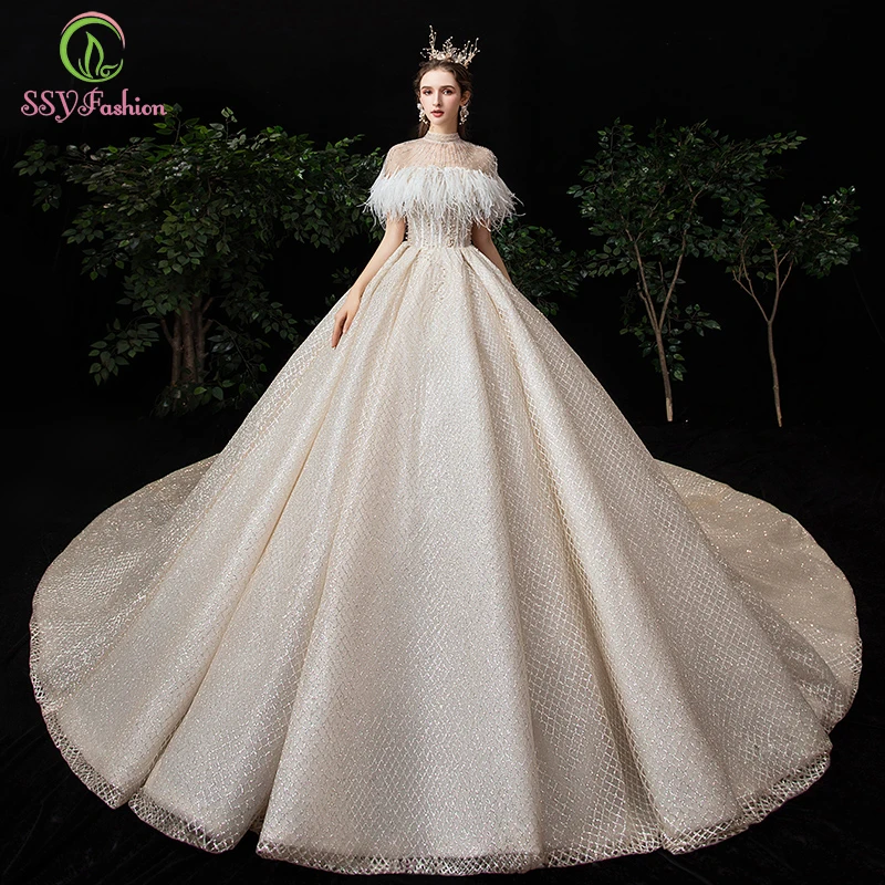 

Женское свадебное платье SSYFashion, роскошное зимнее кружевное платье со шлейфом, пайетками и перьями, без бретелек