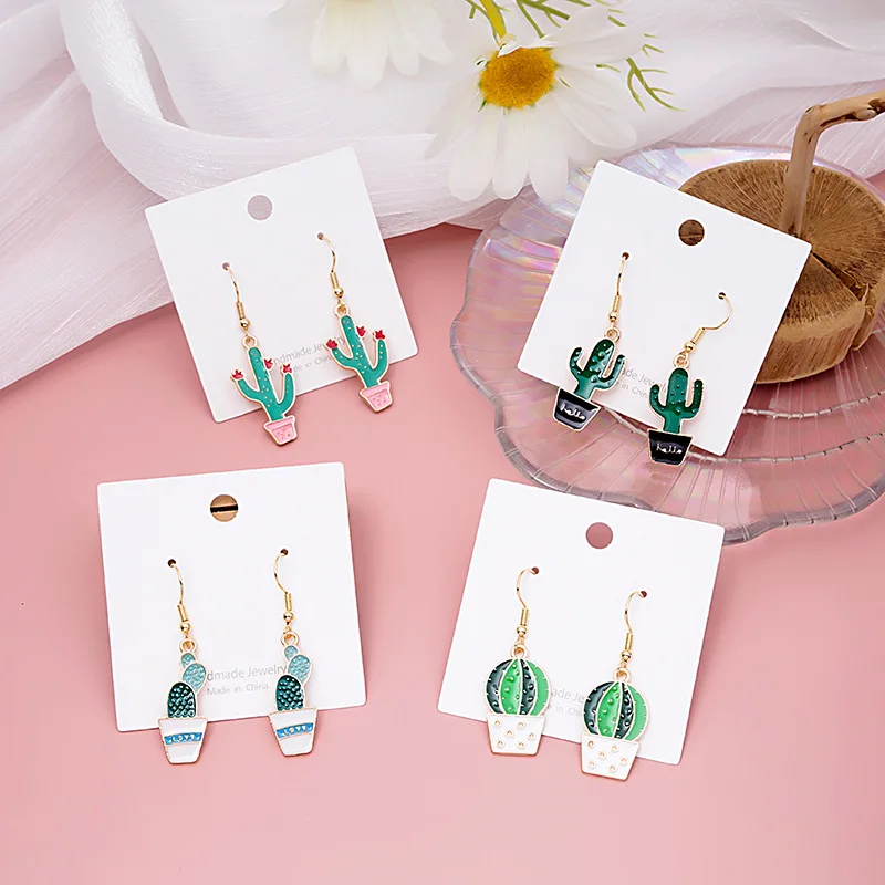 

Cute Desert Oasis Dripping Cactus Fun Earrings Funny And Fun Green Plant Acrylic Earrings