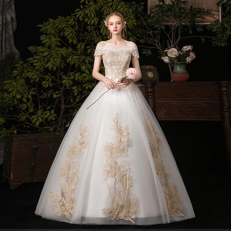 Женское свадебное платье с вырезом лодочкой и открытыми плечами элегантное