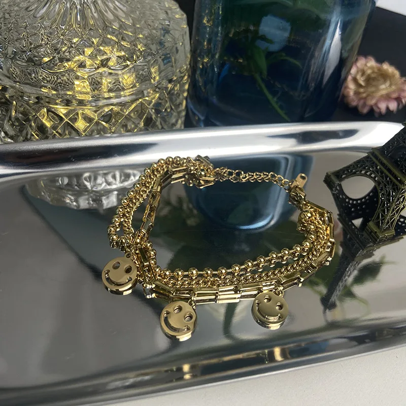 

Многослойный браслет из титановой стали с геометрическим улыбающимся лицом