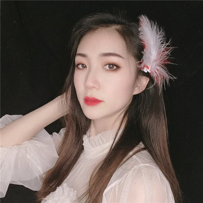 Заколки для волос с белыми перьями 1 шт. |