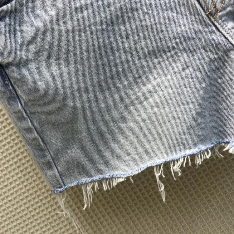 

2021 summer women's new leisure style simple and versatile washing water love edging denim shorts