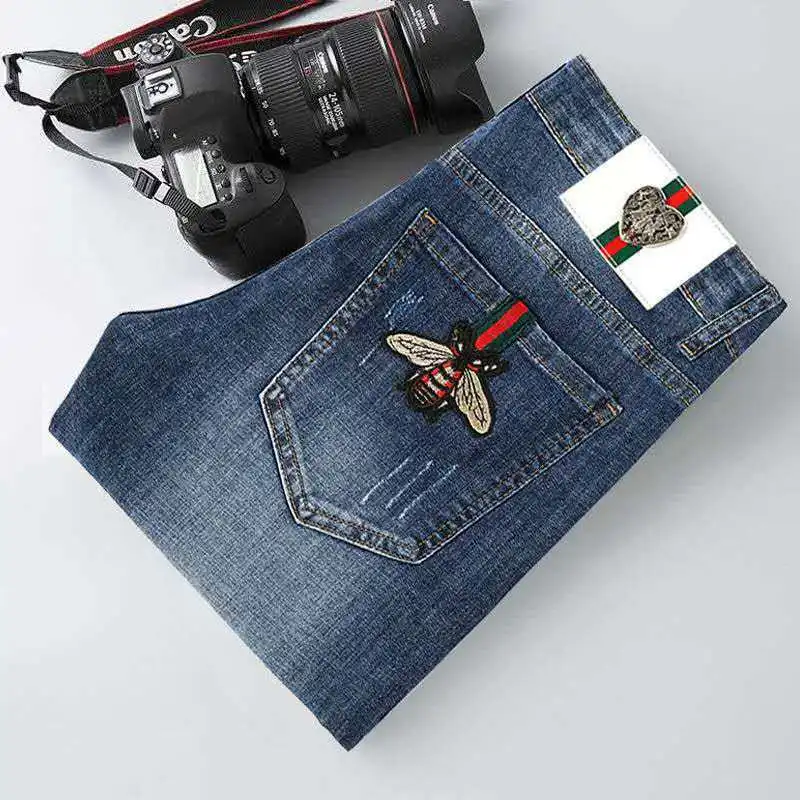 

High-end 2021 autumn and winter new students slim men's small feet pants stretch dark blue denim teenagers long pencil pants