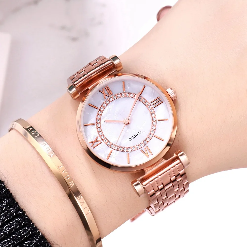 Женские часы из розового золота с кристаллами и сетчатым ремешком нержавеющей