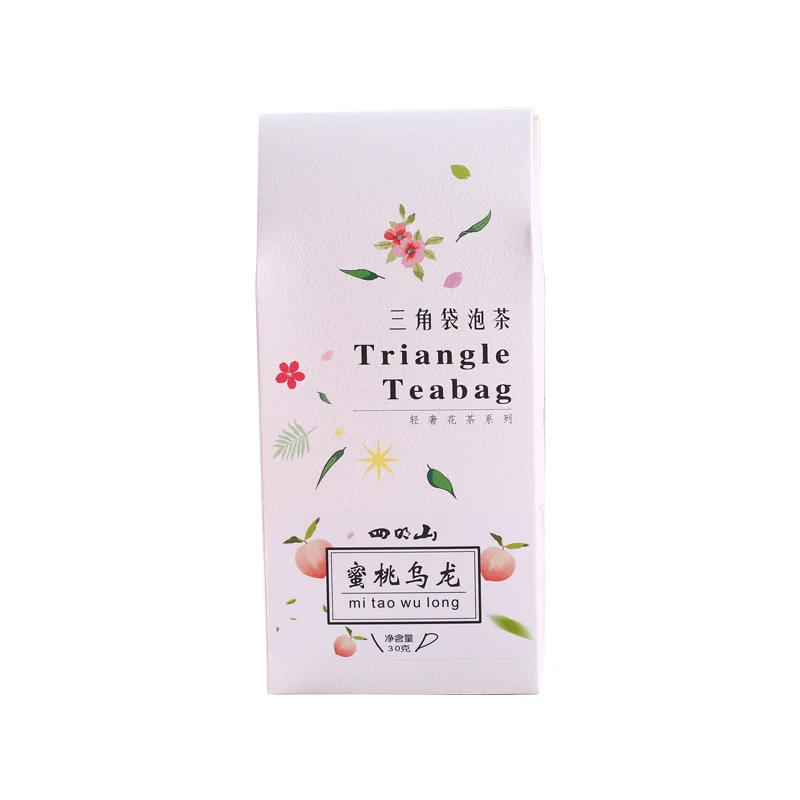 

Four daming mountain oolong peach peach tea bag triangle tea bag cold white peach apple oolong tea fruit tea