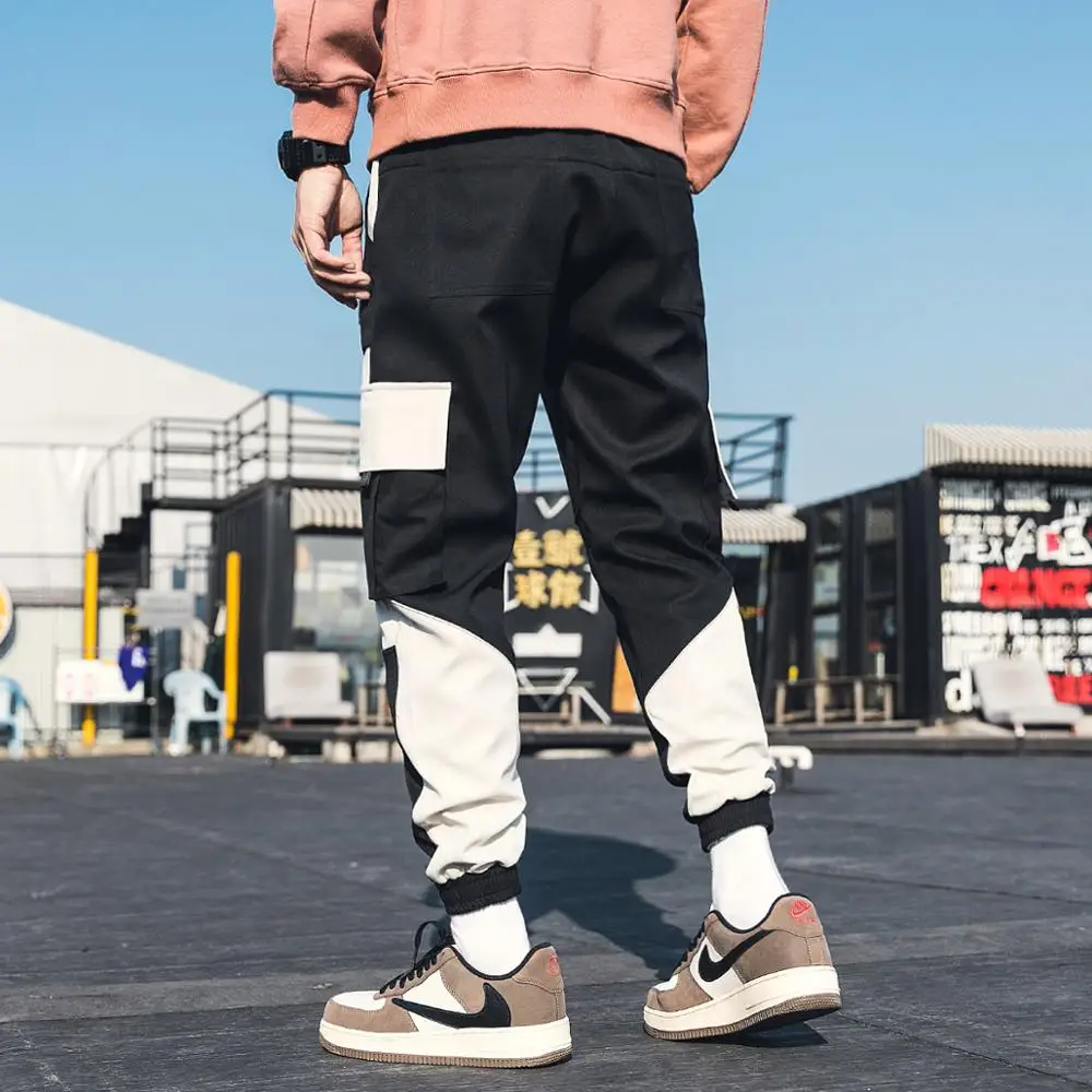 

2020 new spring and autumn color assorted overalls male student trend loose pants Korean men's casual legged Capris trend