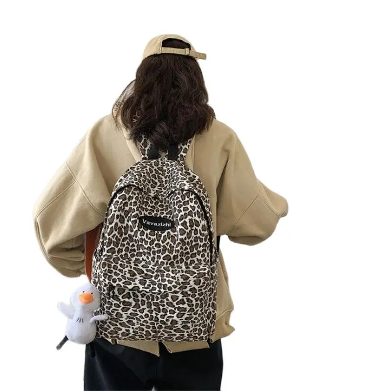 

2021 New Fashion Women Canvas Backpacks Printed Leopard School Bags With Duck Tassel Travel Bags Drop Shipping