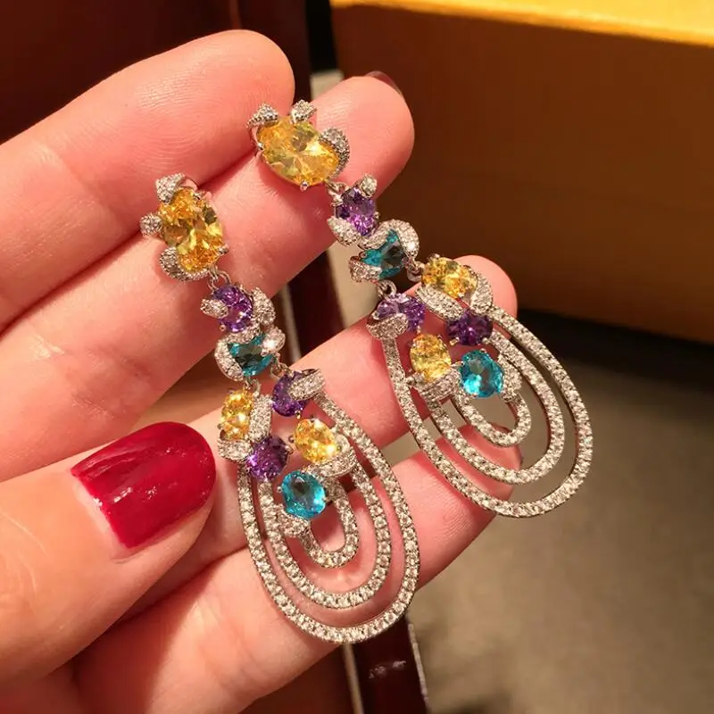 

Женские роскошные Серьги серебряного цвета, большие темпераментные цветные серьги с кисточками из циркония, длинные висячие серьги