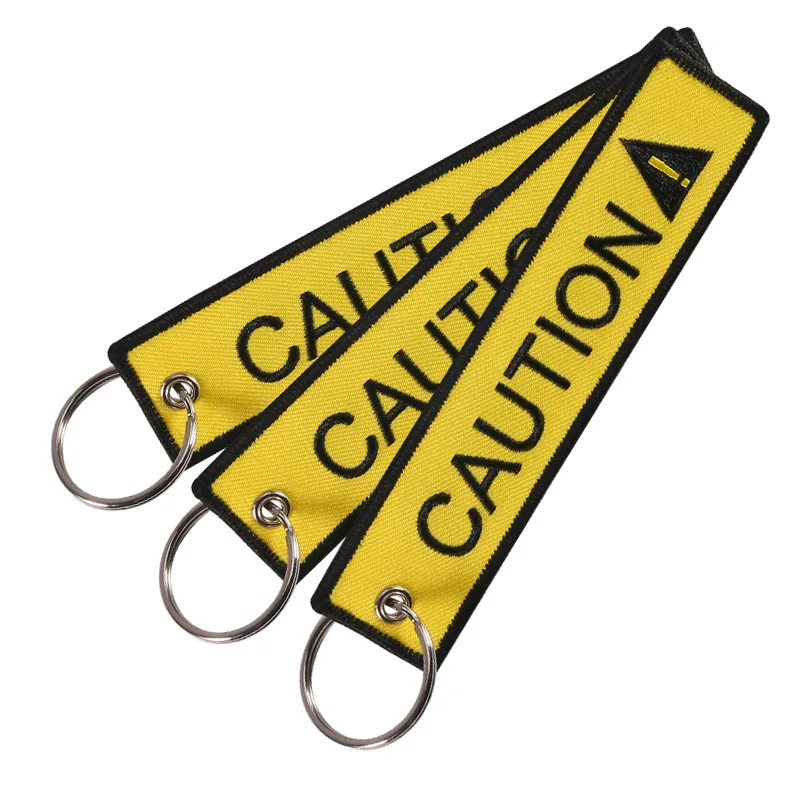 Caution Remove Before Flight осторожно автомобильные брелоки с вышивкой модная черного цвета с надписью и принтом желтый кольцо для ключей для мотоцикла ключи теги 3 шт./лот - Цвет: Caution