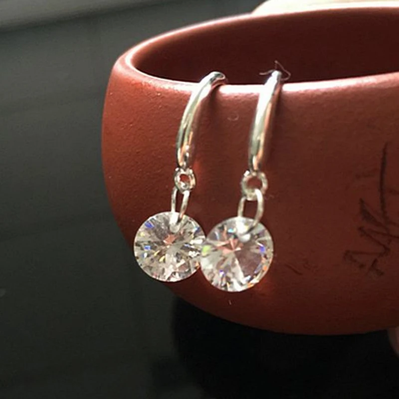 

Women Korean Fashion White Crystal Stud Earrings