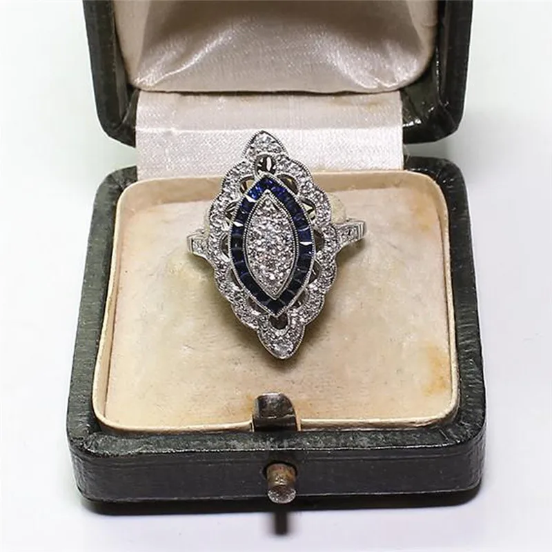 Женское кольцо с голубым камнем обручальное серебряного цвета стразы роскошное