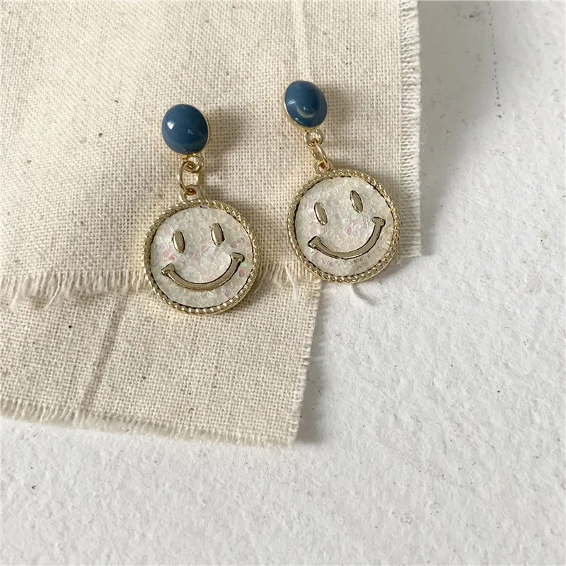 

South Korea temperament contracted sweet girl sequins smiling face earrings female fantasy fairy earrings
