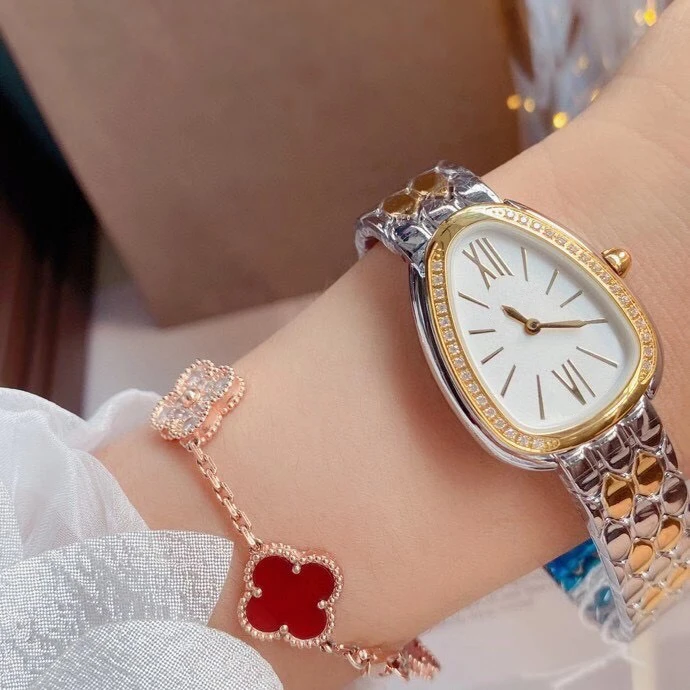 

Classic New Women Snake Silver Yellow Gold Diamond Bezel Green Black Rome Japanese Quartz Stainless Steel Sapphire Watch