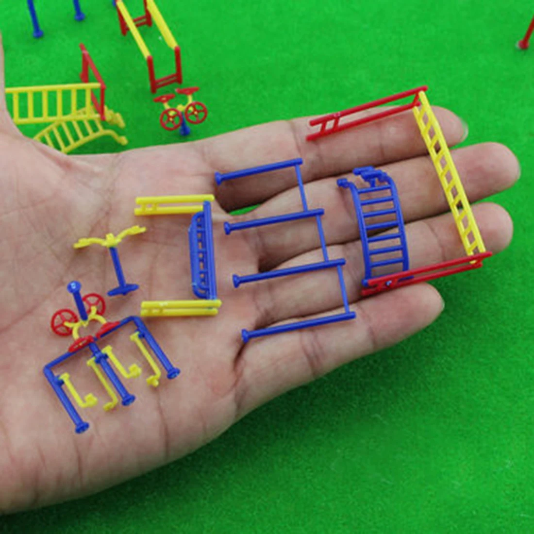 7 штук 1:150 / 1:75 Масштаб Спортивные части Фитнес-оборудование для сборки моделей архитектуры песочного стола - Случайный цвет.