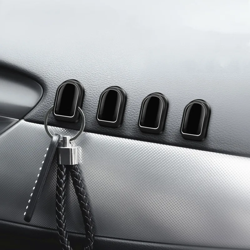 Preise 4 Stücke Auto Haken Organizer Speicher Selbstklebende Halter Für USB Kabel Kopfhörer Keychain Stamm Tasche Unsichtbare Aufhänger Verschluss Clip