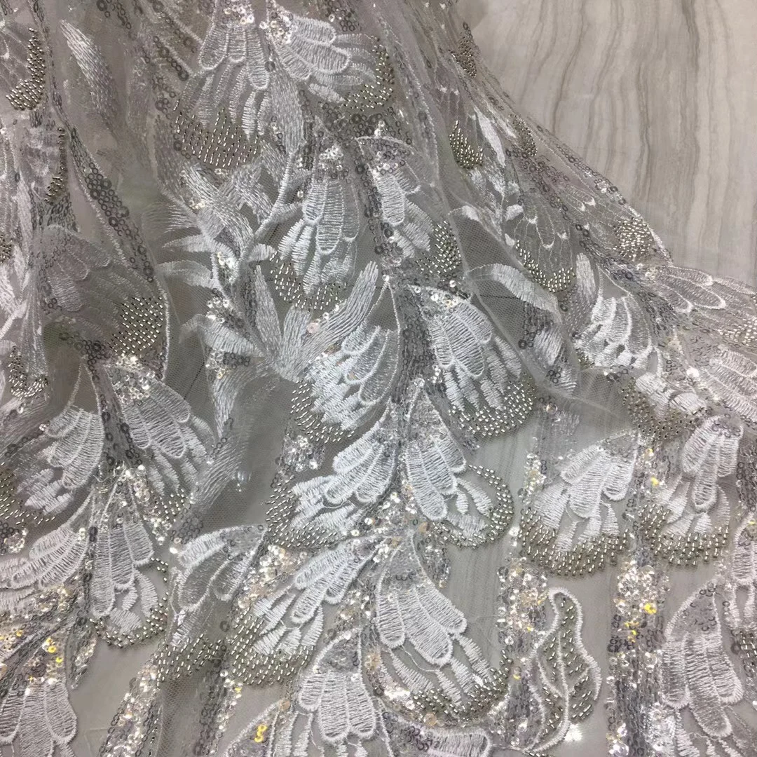 

Top quality White nigerian fashion sequins tulle net african beaded lace fabric Lace Fabric in sequins for ladies party dress