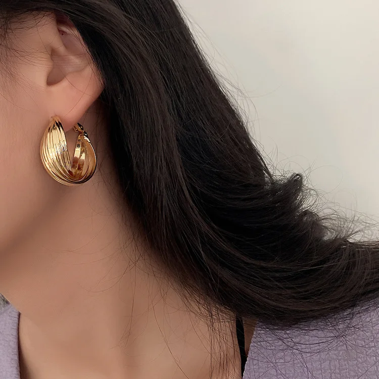 

Серьги из серебра 925 пробы с крупными геометрическими иглами