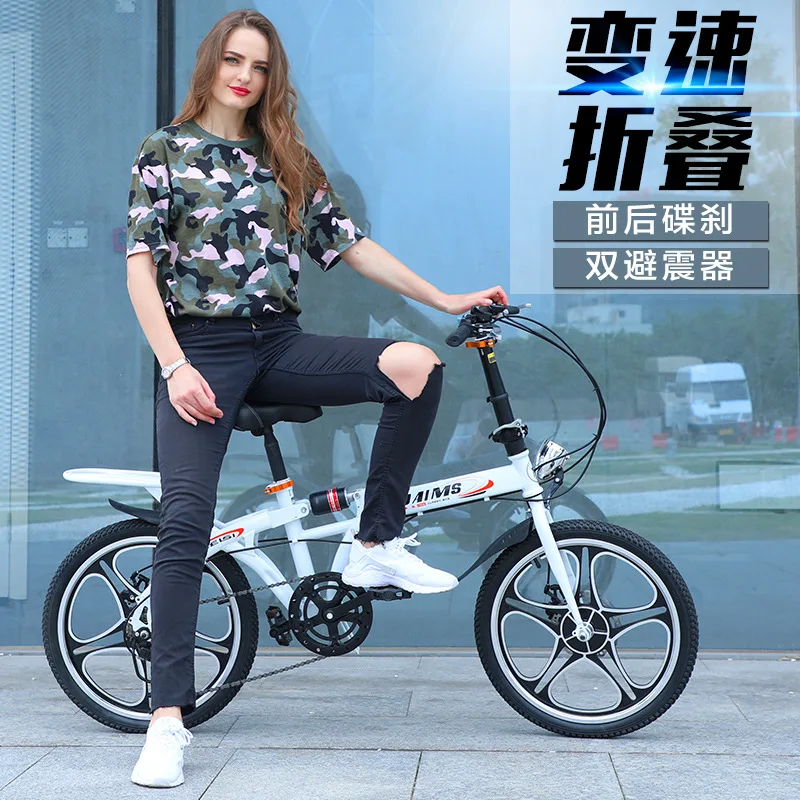 

20 inch folding bicycle front and rear shock absorption double disc brake variable speed integrated wheel student car