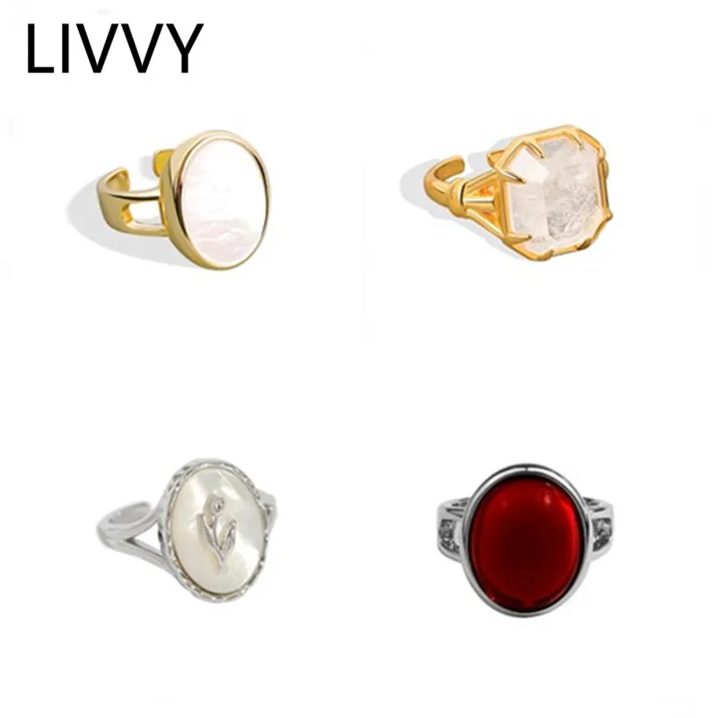 Кольцо женское регулируемое с овальным красным кристаллом и опалом |