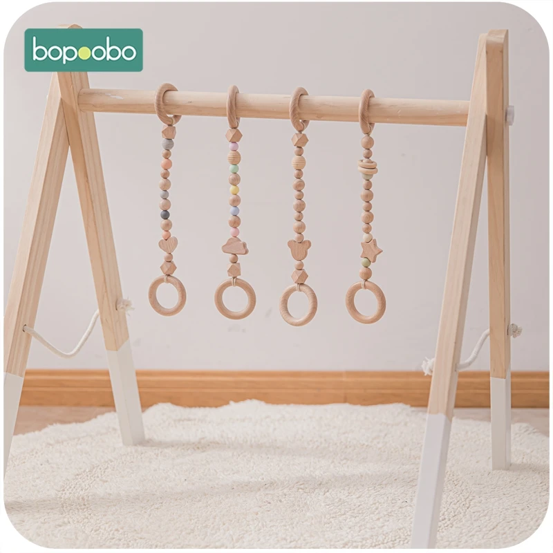 

Bopoobo Baby Teether 4pcs Pacifier Chain Beech Cloud Wooden Clip Geometric Wooden Beads Pacifier Clip Chain Tiny Rod Toys
