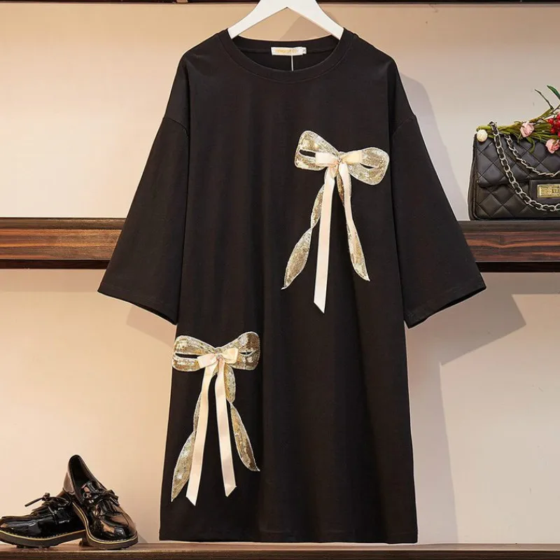 

Платье женское средней длины с золотыми блестками и бантом, свободного покроя